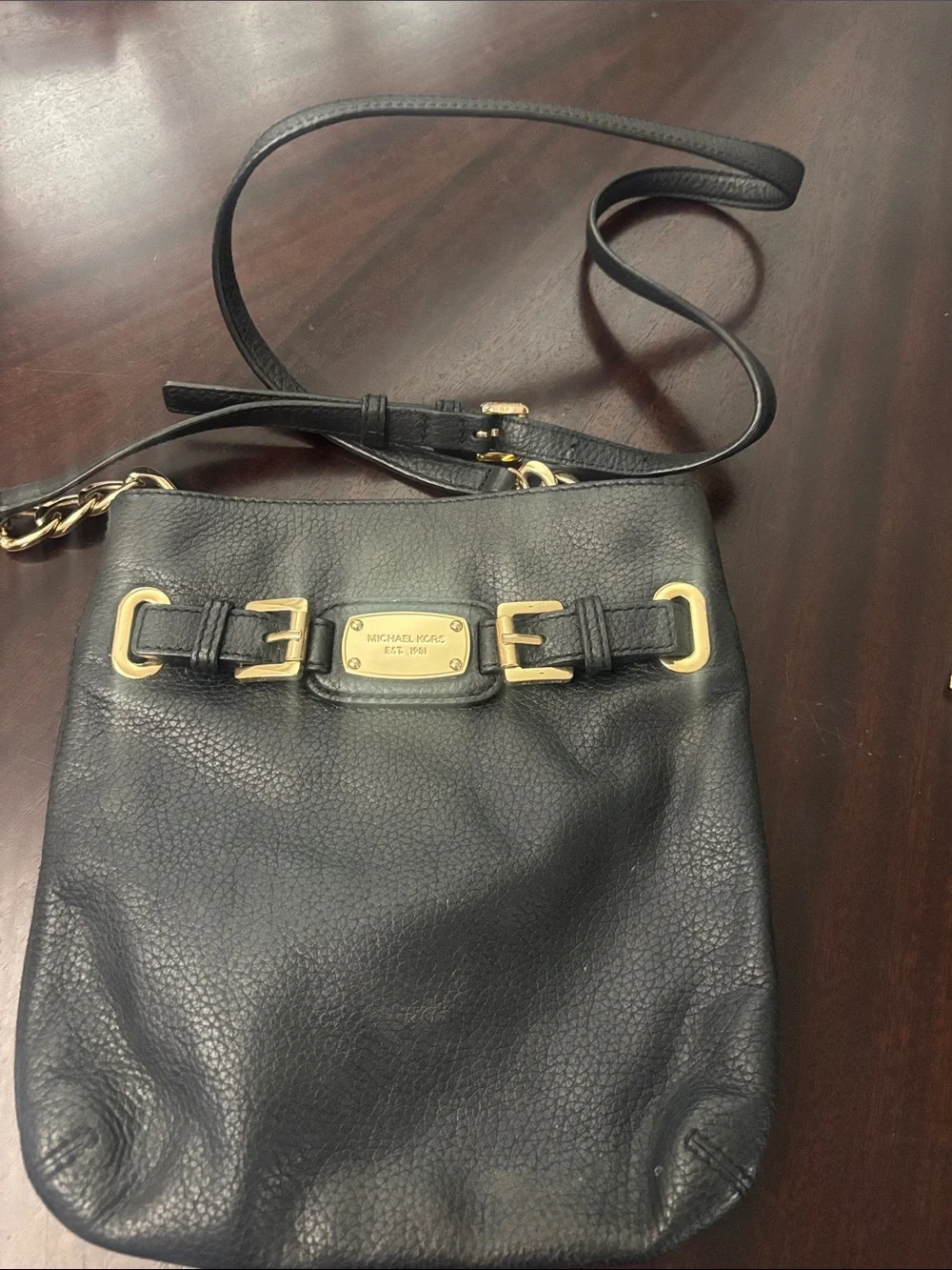 Michael Kors Black Pebbled Leather Crossbody with Gold Plaque